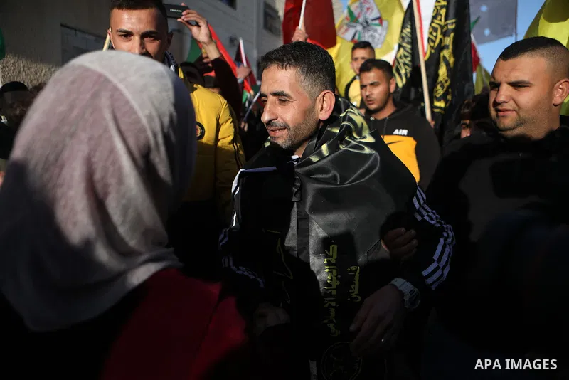 Hisham Abu Hawash a Palestinian prisoner who was on a hunger strike lasted 141 days, in an Israeli prison, is greeted by his relatives and friends upon his release, in the village of Dura, west the West Bank town of Hebr...