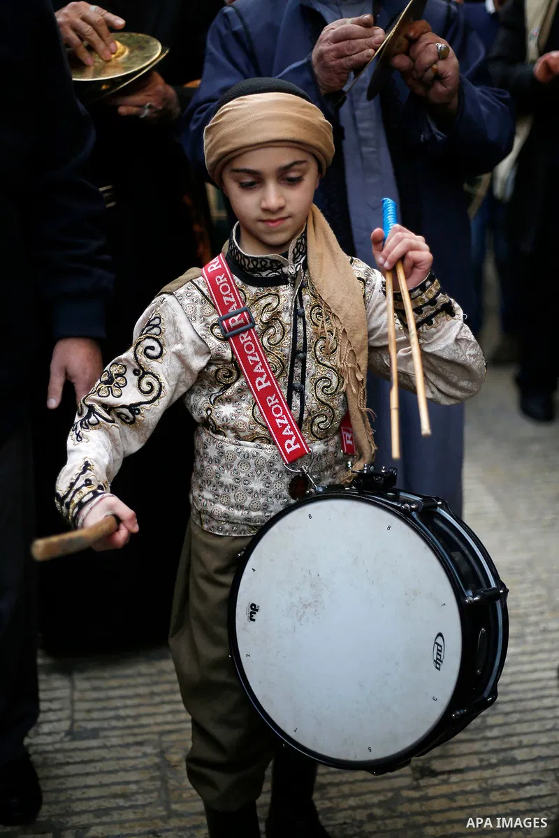 Palestinian sufis perform during a celebration of the Islamic holiday of Isra Mi'raj, in the old city of the West Bank city of Nablus, Feb. 28, 2022. The holiday marks what Muslims believe is the Prophet Mohammad's journ...