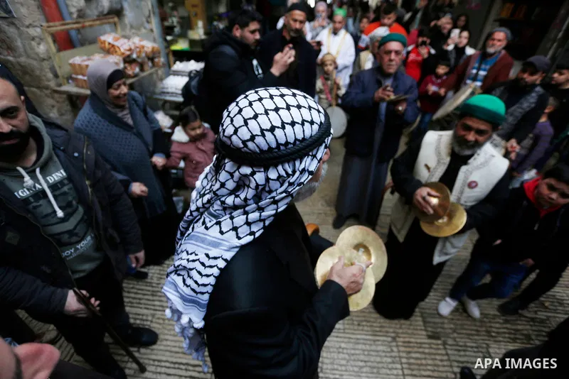 Palestinian sufis perform during a celebration of the Islamic holiday of Isra Mi'raj, in the old city of the West Bank city of Nablus, Feb. 28, 2022. The holiday marks what Muslims believe is the Prophet Mohammad's journ...