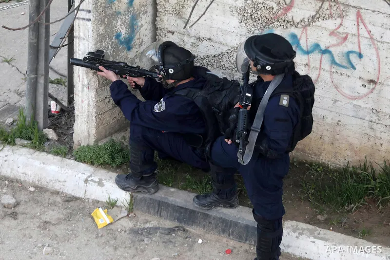 Clashes between Palestinian protesters and Israeli forces following the funeral of Ammar Abu Afifa who was killed by Israeli troops at the al-Arroub refugee camp in the West Bank city of Hebron on March 2, 2022. Photo by...