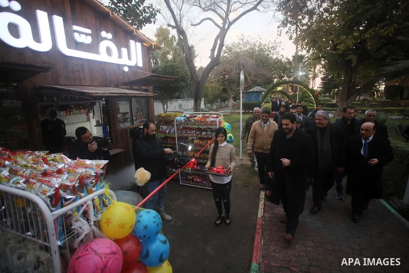 Palestinians attend the opening of the new Gaza Park, in Gaza city, on march 12, 2022. Photo by Mahmoud Ajjour