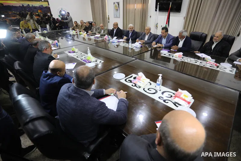 Members of Palestinian factions attend a meeting in Gaza City, after the heightened tension in the West Bank and Jerusalem on April 13, 2022. Photo by Ashraf Amra