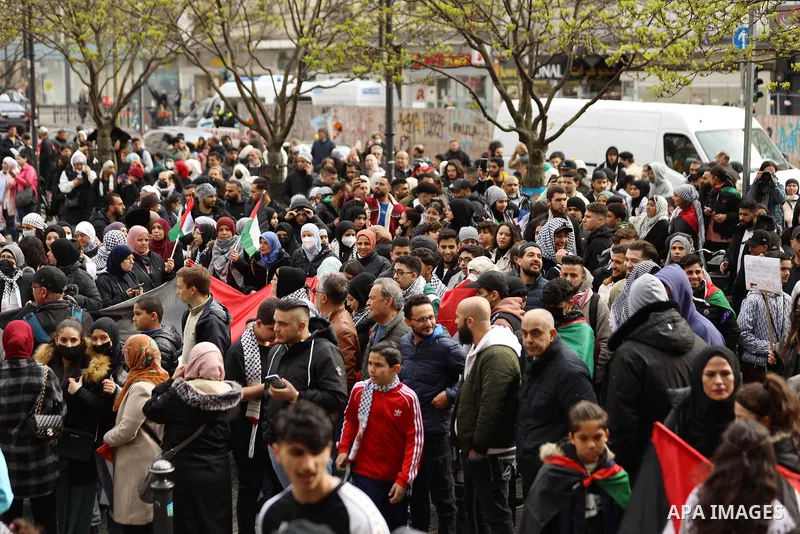 Foreign activists and Palestinians take part in a rally to express support of the Al-Aqsa mosque in Berlin, Germany, on April 22, 2022. Earlier today, scores of worshipers inside the Al-Aqsa Mosque were injured in an Isr...