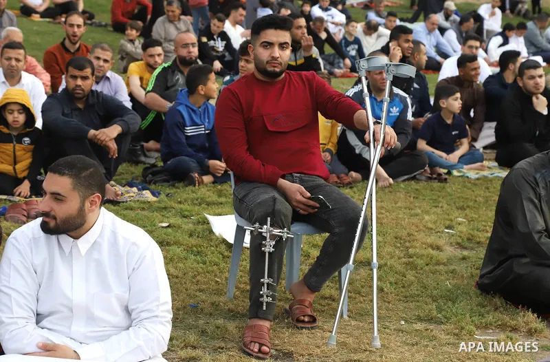 Palestinian Muslim worshipers perform the Eid al-Fitr prayer celebrating the end of the holy Muslim fasting month of Ramadan in Gaza city on May 02, 2022. Photo by Omar Ashtawy
