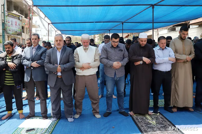 Palestinians attend Friday prayer in solidraity with prisoner on hunger strike since 64-day, in front of Red cross office, in Gaza city on May 6, 2022. A Palestinian under Israel's administrative detention was transferre...