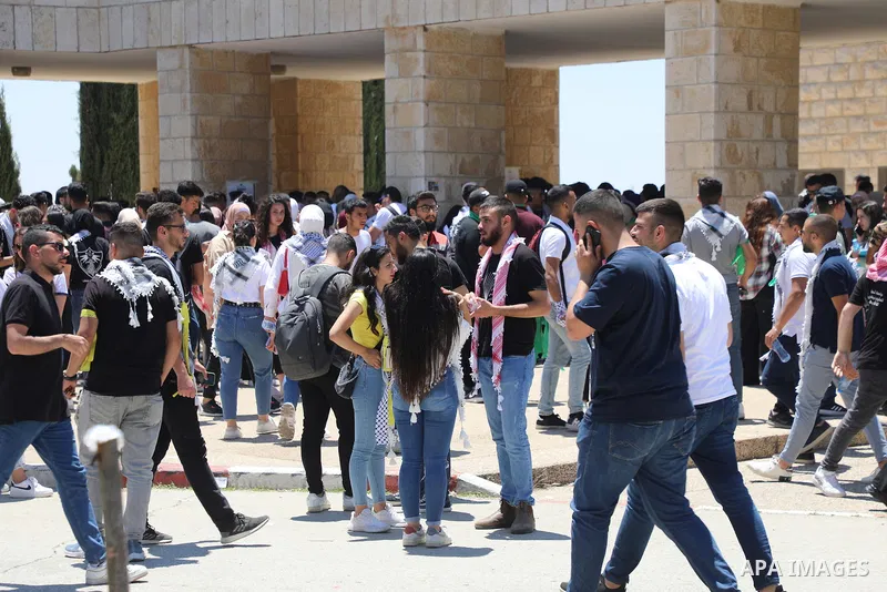Palestinian students take part in student council elections at Birzeit University on the outskirts of Ramallah in the West Bank, on May 18, 2022. Photo by Wajed Nobani