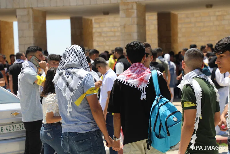 Palestinian students take part in student council elections at Birzeit University on the outskirts of Ramallah in the West Bank, on May 18, 2022. Photo by Wajed Nobani