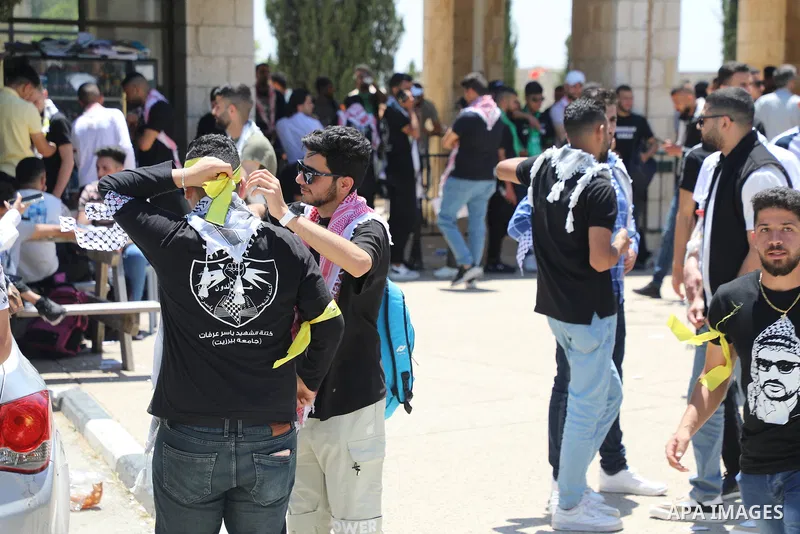 Palestinian students take part in student council elections at Birzeit University on the outskirts of Ramallah in the West Bank, on May 18, 2022. Photo by Wajed Nobani
