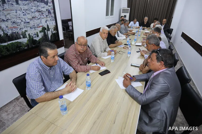 Palestinian members of the national and Islamic forces attend a meeting in Gaza city on May 31, 2022. Photo by Ashraf Amra