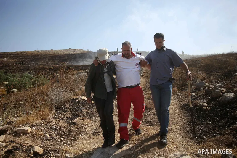 Israeli forces prevent a protest against settlement by Palestinian and foreign activists near outpost of Givat Ronen in Burin village, near the West Bank city of Nablus, on June 17, 2022. Photo by Shadi Jarar'ah