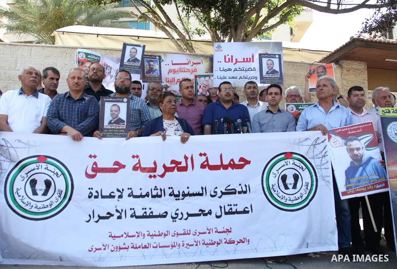 Palestinians take part in a protest to show solidarity with prisoners on hunger strike held in Israeli jails, in front of Red cross office in Gaza city, on June 20, 2022. Six Palestinian freedom fighters in Israeli priso...