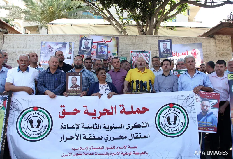 Palestinians take part in a protest to show solidarity with prisoners on hunger strike held in Israeli jails, in front of Red cross office in Gaza city, on June 20, 2022. Six Palestinian freedom fighters in Israeli priso...