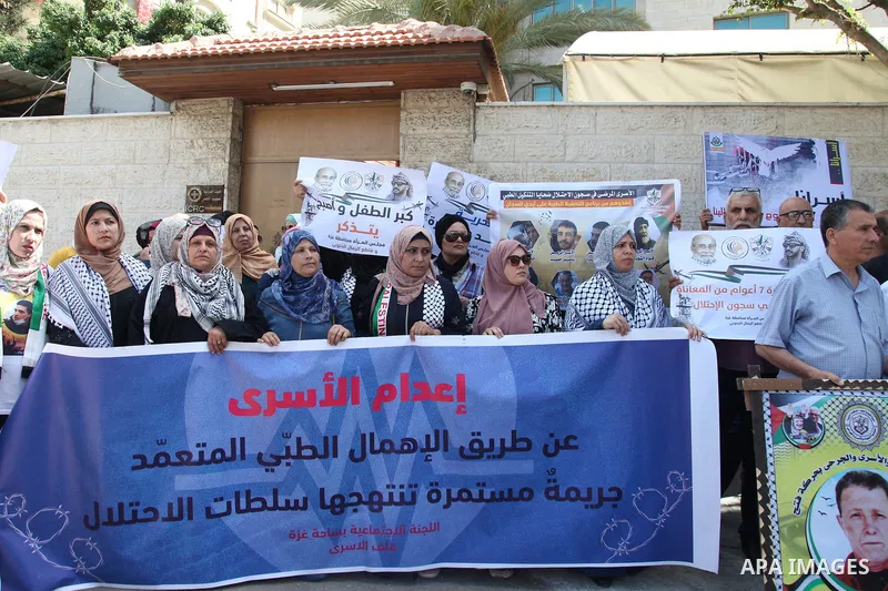 Palestinians take part in a protest to show solidarity with prisoners on hunger strike held in Israeli jails, in front of Red cross office in Gaza city, on June 20, 2022. Six Palestinian freedom fighters in Israeli priso...