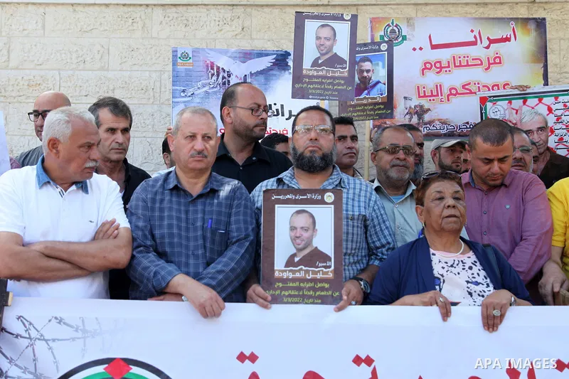 Palestinians take part in a protest to show solidarity with prisoners on hunger strike held in Israeli jails, in front of Red cross office in Gaza city, on June 20, 2022. Six Palestinian freedom fighters in Israeli priso...