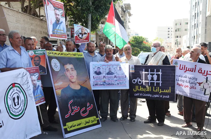 Palestinians take part in a protest to show solidarity with prisoners on hunger strike held in Israeli jails, in front of Red cross office in Gaza city, on June 20, 2022. Six Palestinian freedom fighters in Israeli priso...
