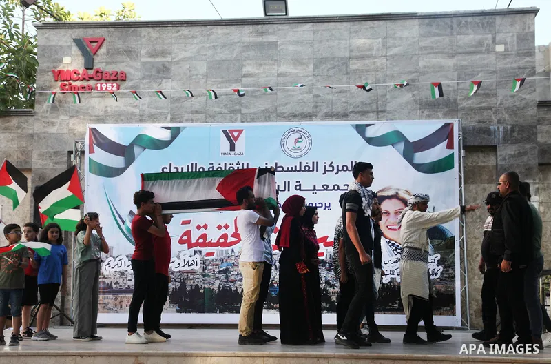 Palestinians attend an artistic operetta in memory of Al Jazeera journalist Shireen Abu Akleh, in Gaza city on July 5, 2022. Al Jazeera journalist Shireen Abu Akleh was likely to have been killed by gunfire from Israeli...