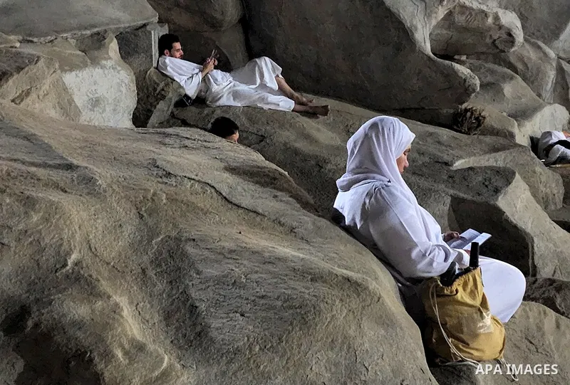 Muslim pilgrims pray on Mount Arafat, as Jabal al-Rahma near Mecca, as they take part in one of the Hajj rituals southeast of the Saudi holy city of Mecca on July 8, 2022. Arafat is the site where Muslims believe the Pro...