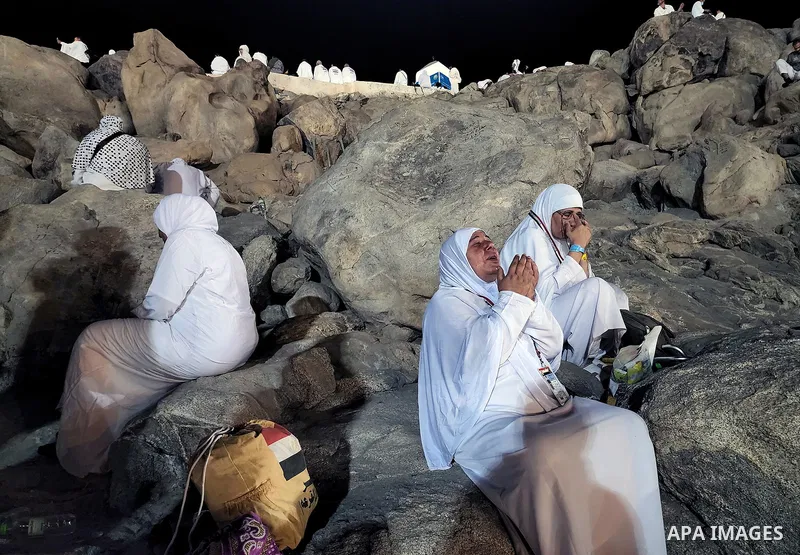 Muslim pilgrims pray on Mount Arafat, as Jabal al-Rahma near Mecca, as they take part in one of the Hajj rituals southeast of the Saudi holy city of Mecca on July 8, 2022. Arafat is the site where Muslims believe the Pro...
