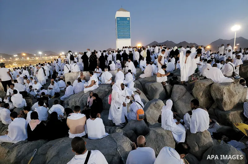 Muslim pilgrims pray on Mount Arafat, as Jabal al-Rahma near Mecca, as they take part in one of the Hajj rituals southeast of the Saudi holy city of Mecca on July 8, 2022. Arafat is the site where Muslims believe the Pro...