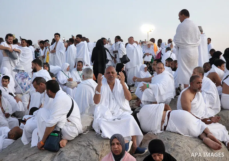Muslim pilgrims pray on Mount Arafat, as Jabal al-Rahma near Mecca, as they take part in one of the Hajj rituals southeast of the Saudi holy city of Mecca on July 8, 2022. Arafat is the site where Muslims believe the Pro...