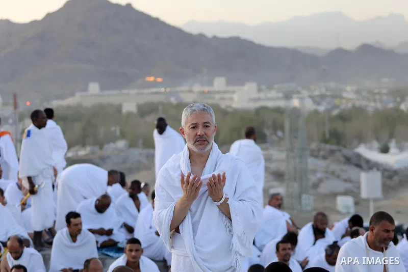 Muslim pilgrims pray on Mount Arafat, as Jabal al-Rahma near Mecca, as they take part in one of the Hajj rituals southeast of the Saudi holy city of Mecca on July 8, 2022. Arafat is the site where Muslims believe the Pro...
