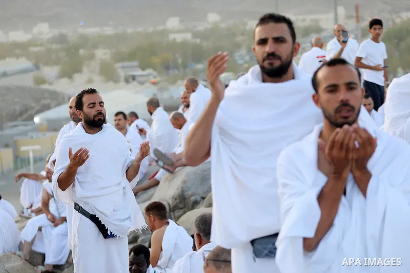 Muslim pilgrims pray on Mount Arafat, as Jabal al-Rahma near Mecca, as they take part in one of the Hajj rituals southeast of the Saudi holy city of Mecca on July 8, 2022. Arafat is the site where Muslims believe the Pro...