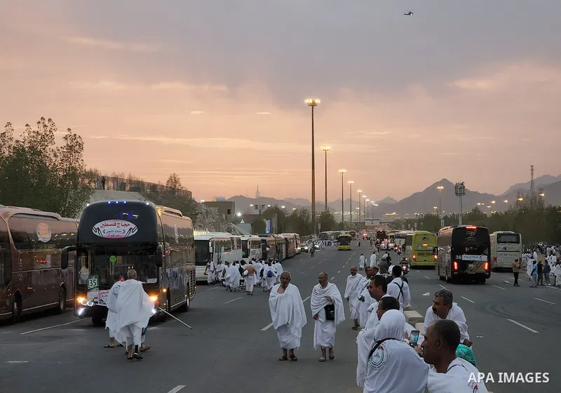 Muslim pilgrims go down from Mount Arafat, also known as Jabal al-Rahma (Mount of Mercy), during the climax of the Hajj pilgrimage southeast of the holy city of Mecca, on July 8, 2022. Arafat is the site where Muslims be...
