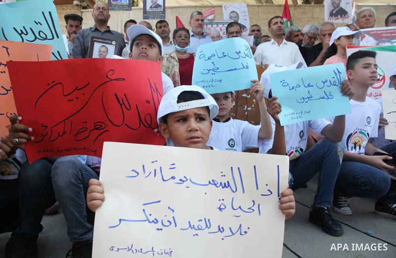 Palestinians take part in a protest to show solidarity with prisoners held in Israeli jails, in front of Red cross office in Gaza city, on July 18, 2022. According to the latest figures from Addameer, the Palestinian Pri...