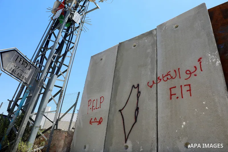 A picture taken on July 18, 2022 shows a new section of Israel's controversial separation barrier built by Israeli authorities around Beit El settlement at the northern entrance to the city of Ramallah in the West Bank....