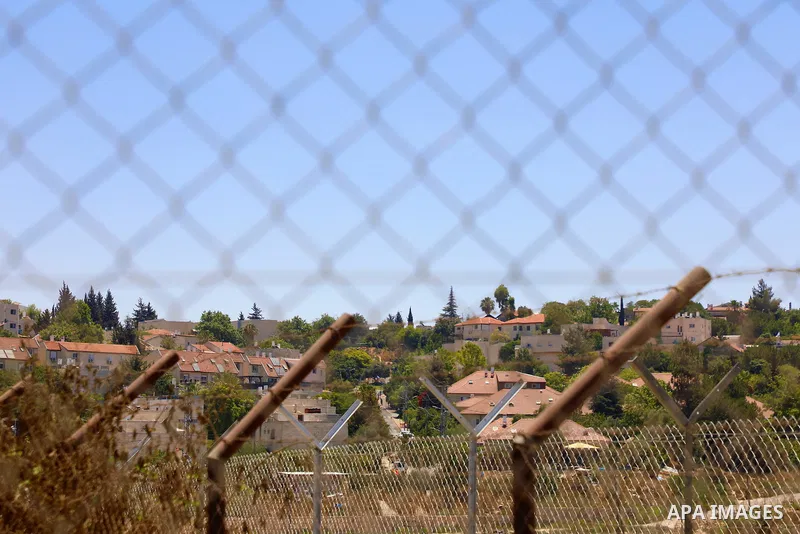 A picture taken on July 18, 2022 shows a new section of Israel's controversial separation barrier built by Israeli authorities around Beit El settlement at the northern entrance to the city of Ramallah in the West Bank....