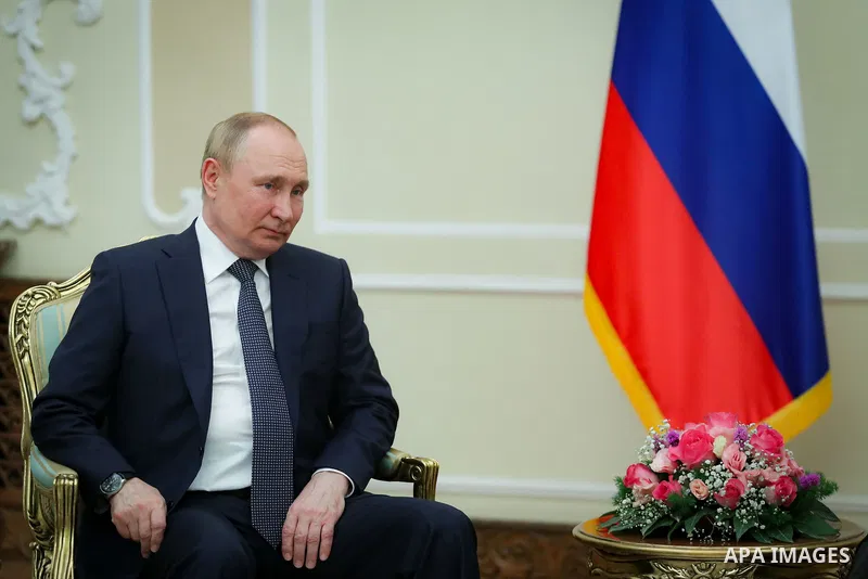 A handout photo made available by the Iranian presidential office shows Iranian President EBRAHIM RAISI (R) and his Russian counterpart VLADIMIR PUTIN (L), attend a meeting in Tehran, Iran, on 19 July 2022. Putin is in T...