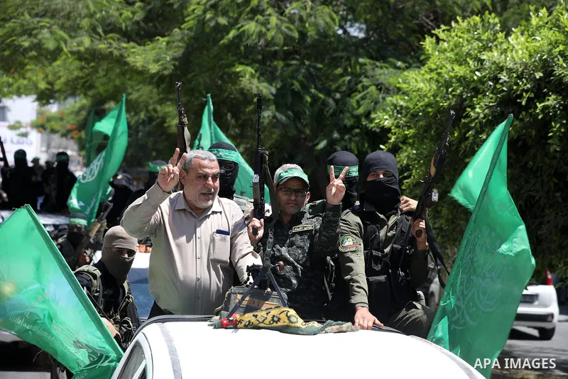 Palestinian prisoner Ashraf Abu Moghasib, who spent 20 years in Israeli jails is greeted by his relatives and friends upon his release in Deir al-Balah in the center of Gaza strip on July 31, 2022. Photo by Ashraf Amra
