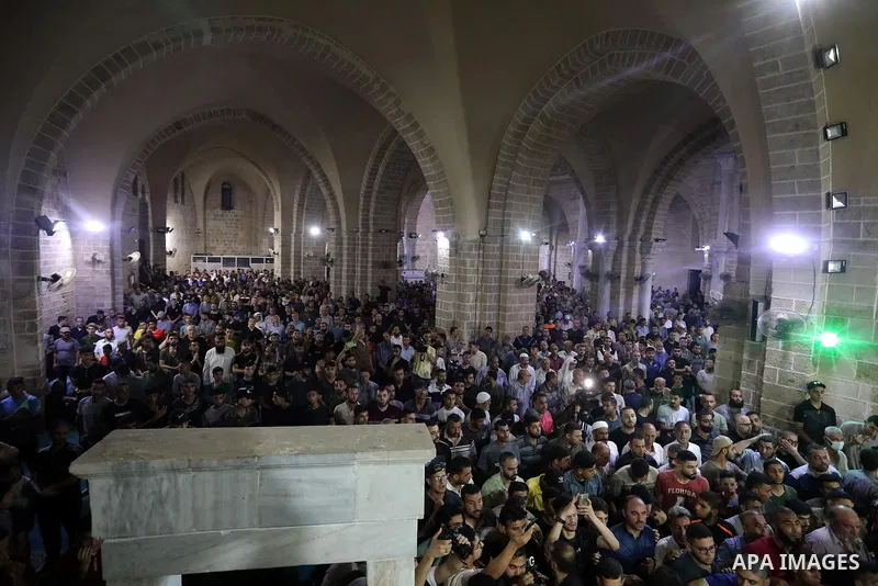 Palestinians attend the funeral of Islamic Jihad commander Tayseer al-Jabari who was killed in an Israeli air strike along with another Palestinians in Gaza City on August 5, 2022. The senior commander of Islamic Jihad w...