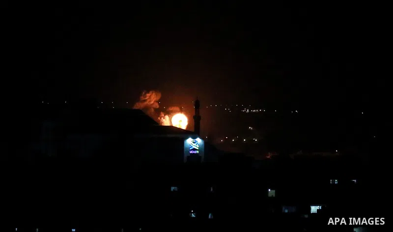 Flames and smoke rise following an Israeli air strike on Gaza City on August 5, 2022. Palestinian militants fired rockets at Israel from the Gaza Strip this evening. The rocket fire come followed deadly air strikes by th...
