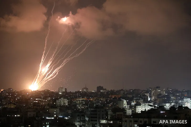 A salvo of rockets is fired from Gaza City toward Israel, on August 6, 2022. The Israeli military warned deadly aerial operations against militants in Gaza could last a week, as exchanges of fire were ongoing for a secon...