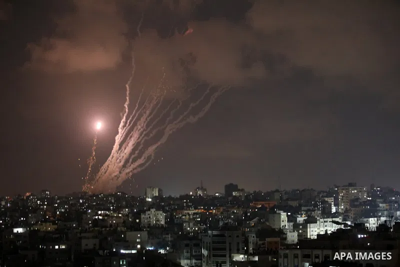 A salvo of rockets is fired from Gaza City toward Israel, on August 6, 2022. The Israeli military warned deadly aerial operations against militants in Gaza could last a week, as exchanges of fire were ongoing for a secon...