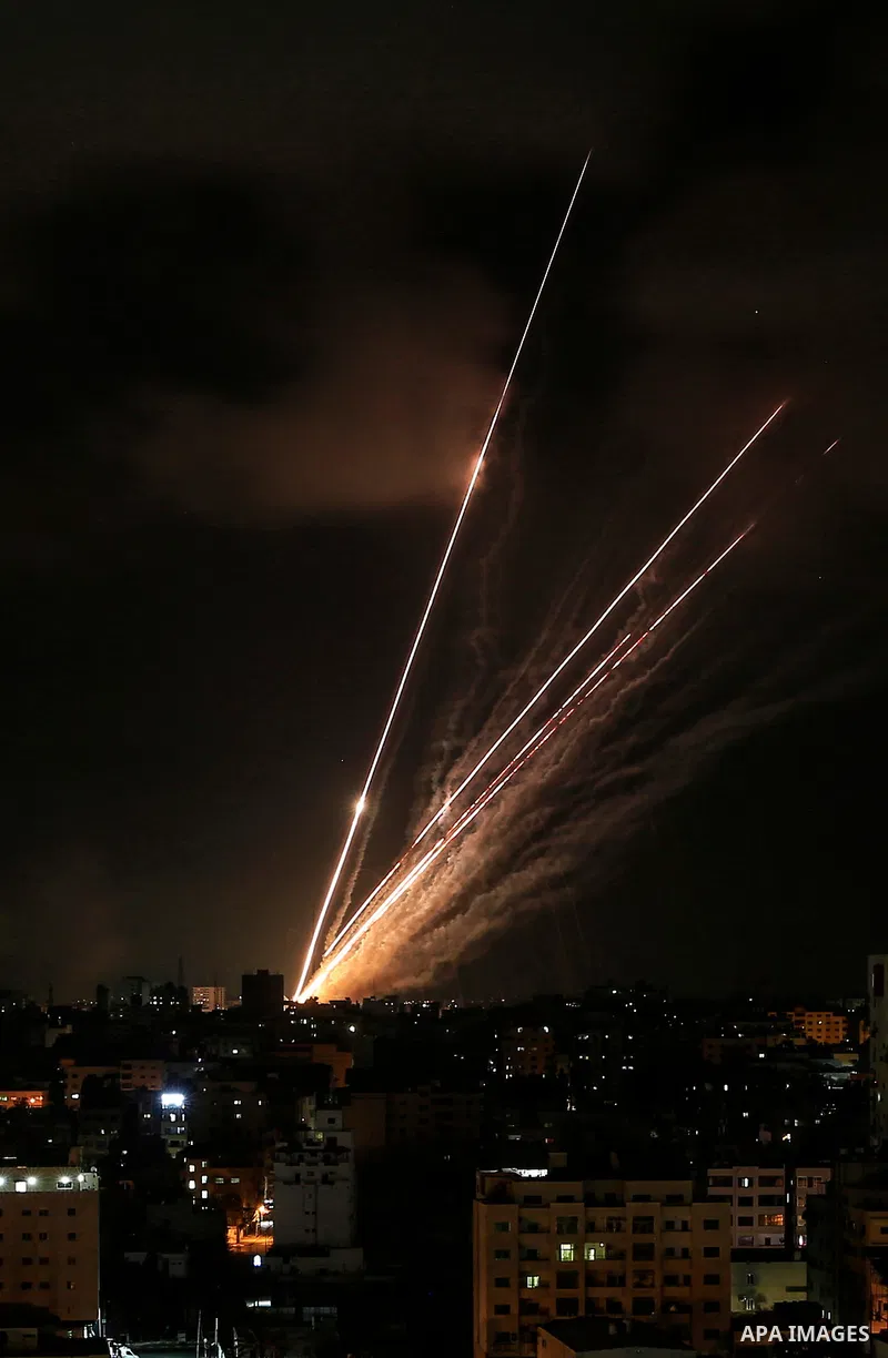 A salvo of rockets is fired from Gaza City toward Israel, on August 6, 2022. The Israeli military warned deadly aerial operations against militants in Gaza could last a week, as exchanges of fire were ongoing for a secon...