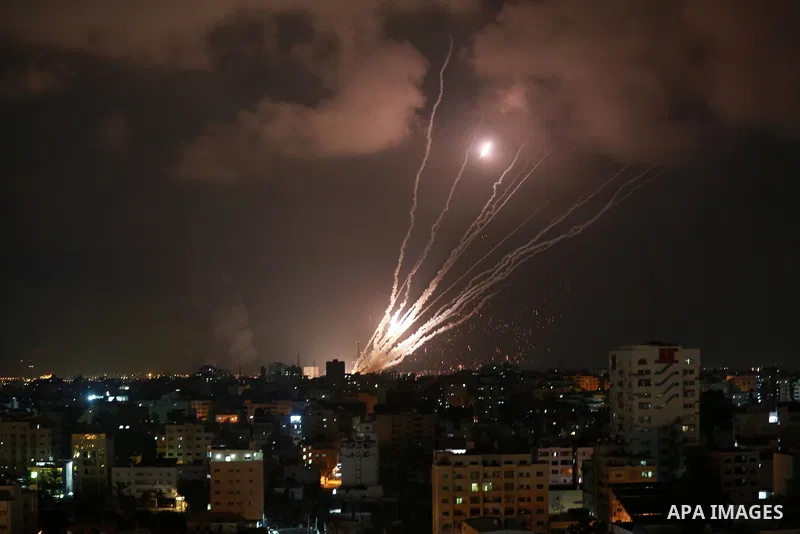 A salvo of rockets is fired from Gaza City toward Israel, on August 6, 2022. The Israeli military warned deadly aerial operations against militants in Gaza could last a week, as exchanges of fire were ongoing for a secon...