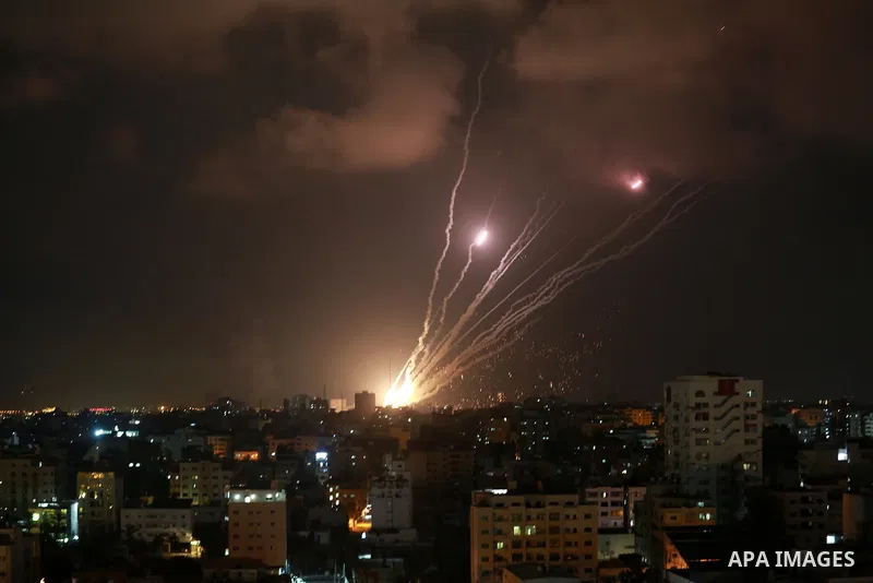 A salvo of rockets is fired from Gaza City toward Israel, on August 6, 2022. The Israeli military warned deadly aerial operations against militants in Gaza could last a week, as exchanges of fire were ongoing for a secon...