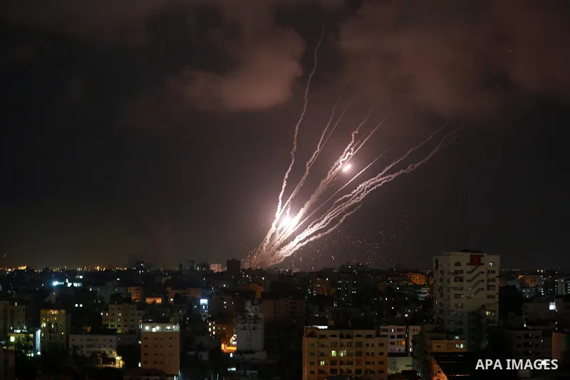 A salvo of rockets is fired from Gaza City toward Israel, on August 6, 2022. The Israeli military warned deadly aerial operations against militants in Gaza could last a week, as exchanges of fire were ongoing for a secon...