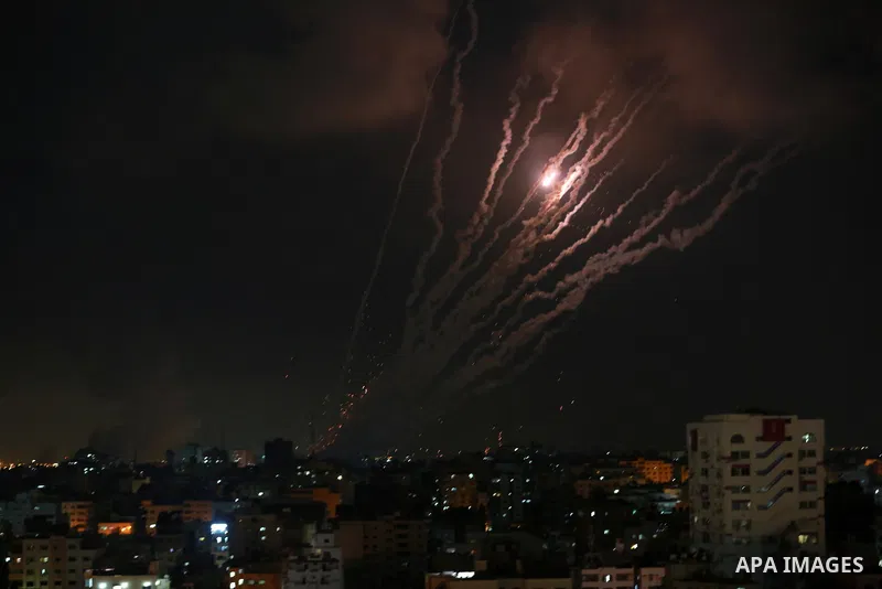 A salvo of rockets is fired from Gaza City toward Israel, on August 6, 2022. The Israeli military warned deadly aerial operations against militants in Gaza could last a week, as exchanges of fire were ongoing for a secon...