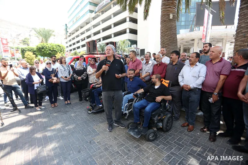 Palestinians take part in a protest in solidarity with the Gaza Strip, in the West Bank city of Nablus on August 7, 2022. The death toll from violence in Gaza has risen to 31, including six children, the health ministry...
