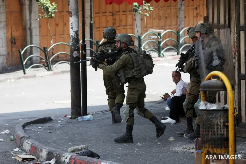 Palestinian protesters clash with Israeli forces in the West Bank city of Hebron following the killing of 3 Palestinian duting Israeli military raid in Nablus city, on August 9, 2022. Three people were killed including P...