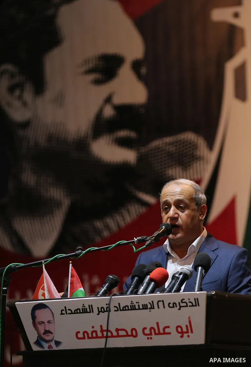 Deputy Secretary-General of Popular Front for the Liberation of Palestine (PFLP), Jamil Mezher speaks during the national festival the The 21th anniversary of the killing of Abu Ali Mustafa, leader of (PFLP), in Gaza cit...