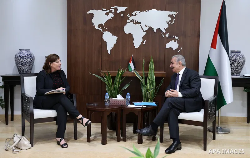 Palestinian Prime Minister Mohammad Shtayyeh meets with New USAID Mission Director in the West Bank and Gaza Amy Tohl-Stoll, in the West Bank city of Ramallah on August 30, 2022. Photo by Shadi Hatem\ apaimages