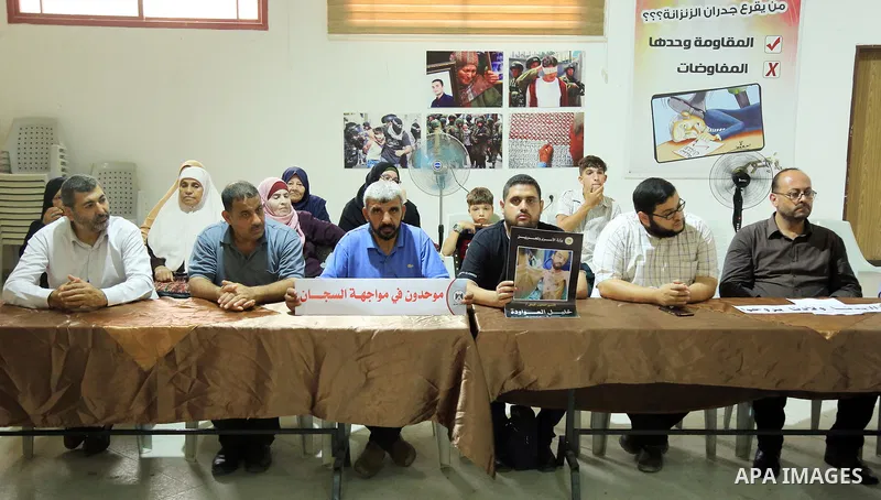 Members of Palestinian factions take part in a meeting in solidarity with prisoners on hunger strike in Israeli jails, in Gaza City on August 31, 2022. More than 4500 Palestinian freedom fighters incarcerated in Israel b...