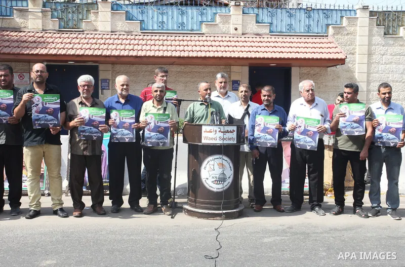 Palestinians take part in a protest in solidarity with prisoners on hunger strike in Israeli jails, in front of the headquarters of the High Commissioner in Gaza City on September 01, 2022. Palestinian detainee in Israel...