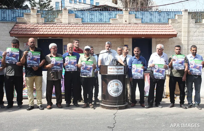 Palestinians take part in a protest in solidarity with prisoners on hunger strike in Israeli jails, in front of the headquarters of the High Commissioner in Gaza City on September 01, 2022. Palestinian detainee in Israel...