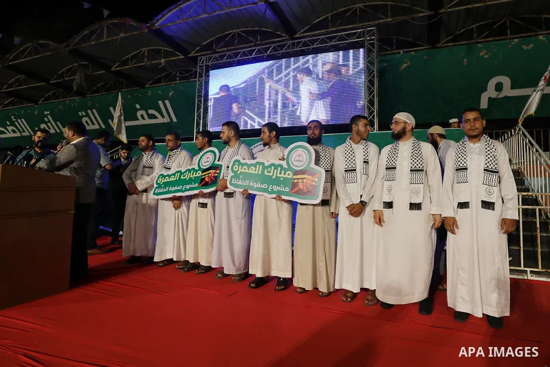 People attend a honor ceremony of 581 Palestinians who recited from memory the entire Koran, Islam's holy book, in an event last week in one sitting, in Gaza City on Sep. 01, 2022. Photo by Mahmoud Nasser\ apaimages