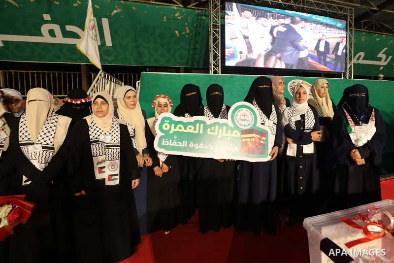 People attend a honor ceremony of 581 Palestinians who recited from memory the entire Koran, Islam's holy book, in an event last week in one sitting, in Gaza City on Sep. 01, 2022. Photo by Mahmoud Nasser\ apaimages